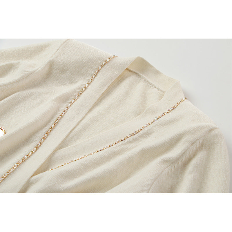 Abito doppiopetto in maglia dettagli dorati