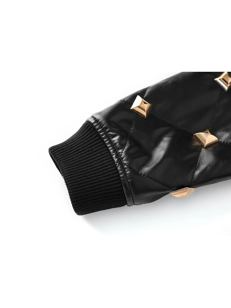 Bomber in ecopelle con borchie dorate