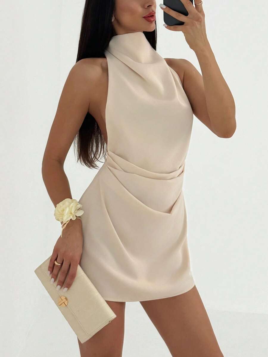 Mini abito drappeggiato schiena nuda