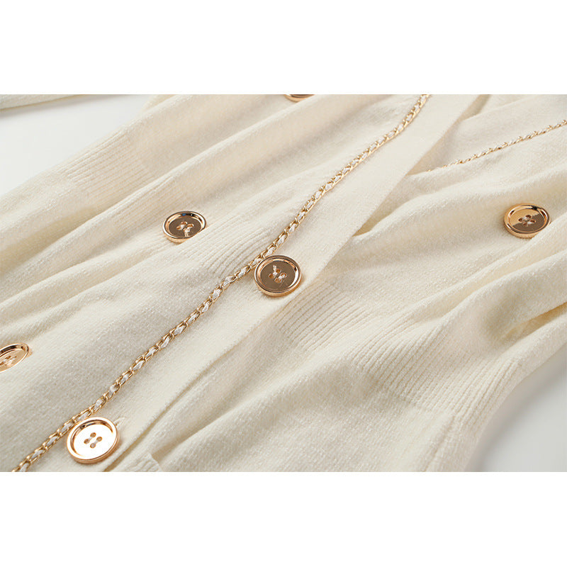 Abito doppiopetto in maglia dettagli dorati