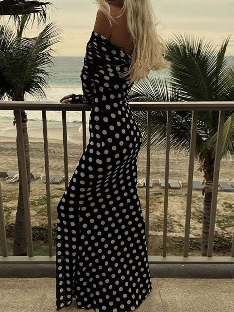 Abito lungo aderente spalle scoperte a pois